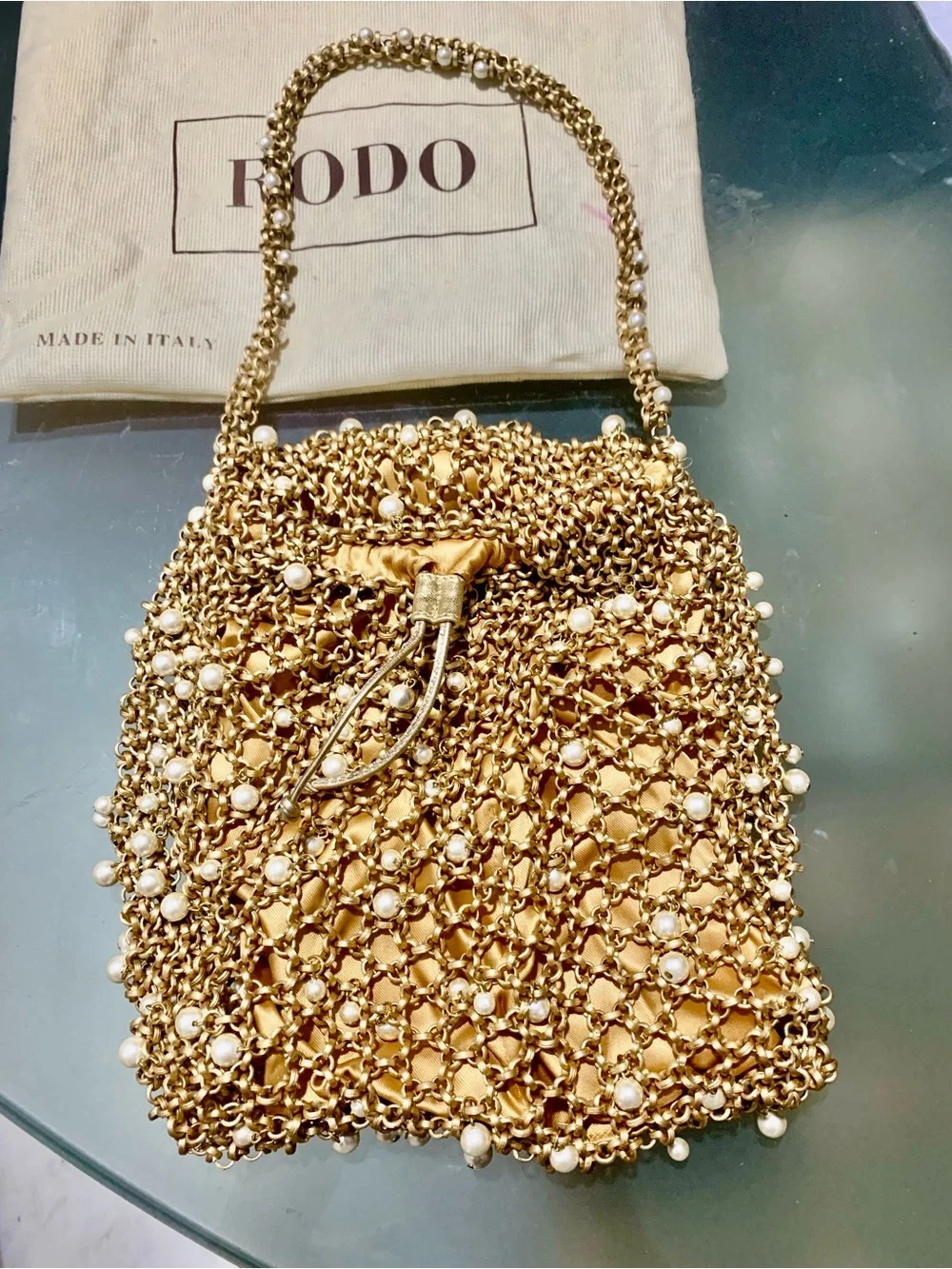 Never used bag .Rodo ?!!designer  dust bag included.!Great eve bag.